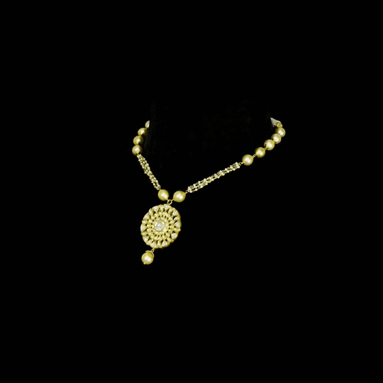 Radiate timeless elegance with these exquisite Diamond Polki tops, beautifully accented with lustrous pearl drops—perfect for adding royal charm to every occasion.(KMPE1368)