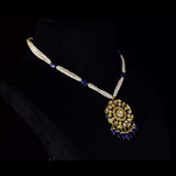 Blue Meenakari Pendant Set Elegant blue meenakari pendant set adorned with diamond polki, gracefully strung with pearls and sapphire maniya, celebrating timeless heritage and sophistication.(KMPE1372)