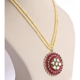 Fusion Ruby Pearl Pendant Contemporary pendant showcasing vibrant rubies, diamond polki and brilliant diamonds, gracefully suspended from a luminous double-strand pearl necklace for timeless sophistication.(KMPE1389)