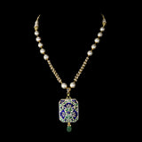 Blue Meenakari Pendant Set Elegant blue meenakari pendant set adorned with diamond polki, gracefully strung with pearls and emerald accents, blending timeless artistry with refined elegance.(KMPE1397)