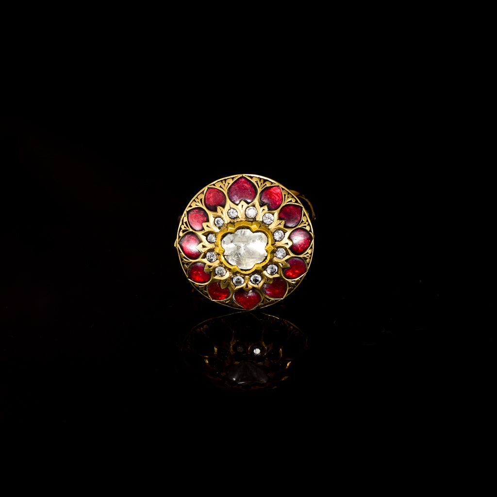 Celebrate timeless beauty with this traditional Jadau ring, adorned with vibrant color stones and sparkling diamond Polki. A masterpiece of heritage craftsmanship, perfect for adding regal elegance to any occasion.(KMR0168)
