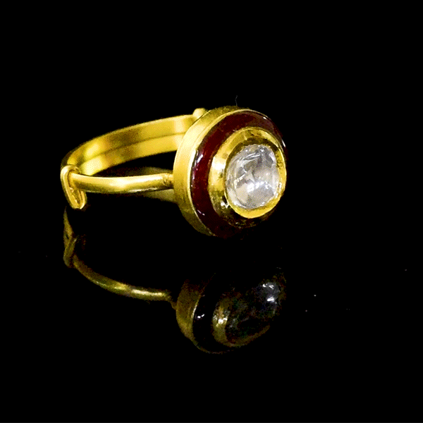 Red enameled ring features uncut diamond Polki, showcasing timeless artistry and vibrant charm—perfect for adding a regal touch to any look.(KMR0172)