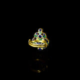Grace your fingers with this green enameled ring, featuring uncut diamond Polki. Adjustable in size, it blends traditional charm with modern comfort for effortless elegance.(KMR0173)