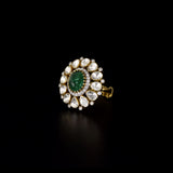 Emerald Halo Ring A vivid emerald takes center stage, encircled by radiant diamond polki and brilliant diamonds, creating a timeless statement of refined luxury.(KMR0180)