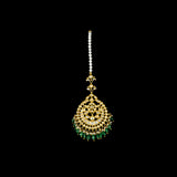 Adorn your look with this elegant Ekposta Maangtika featuring uncut diamond Polki, beautifully strung with emerald maniya and pearls.(KMTK0226)