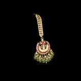 Radiate royal charm with this chand-style maangtika, featuring uncut diamond Polki and rubies, beautifully accented with emerald beads and pearls for a timeless, traditional look.(KMTK0242)