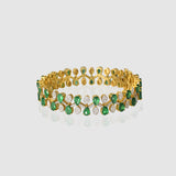 Emerald Diamond Bangle Elegant bangle adorned with vibrant pear-shaped emeralds and brilliant diamonds, beautifully arranged in a graceful floral pattern for timeless sophistication and luxury.(PGDB078)