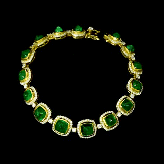 Beautiful emerald cabochons and sparkling diamonds come together in this elegant bracelet, making it a perfect piece to add charm, style, and everyday luxury to your jewelry collection.(PGDBR044)