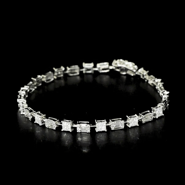 Featuring a refined arrangement of brilliant and baguette-cut diamonds, this bracelet embodies modern luxury with classic charm. (PGDBR070)