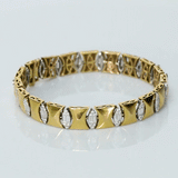 Sleek gold meets shimmering diamonds in a flexible design—crafted for effortless elegance and everyday luxury. (PGDBR073)