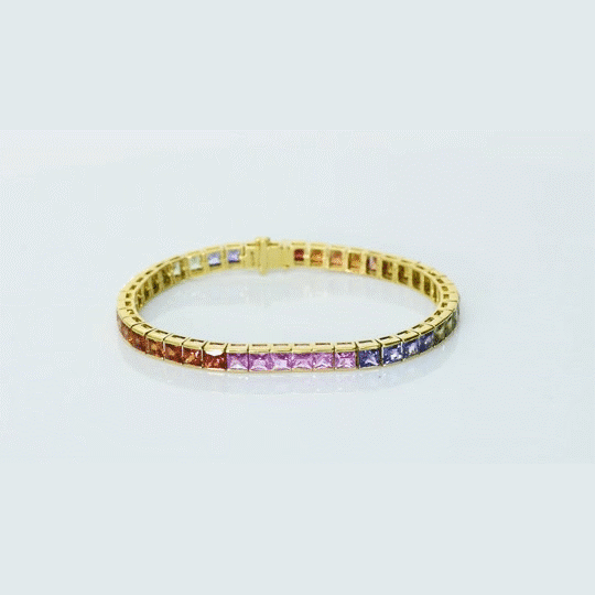 Bursting with vibrant sapphire hues, this bracelet brings together color, sparkle, and elegance for a truly eye-catching statement.(PGDBR079)
