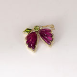 Butterfly Brooch Graceful butterfly brooch featuring carved pink tourmaline wings, vibrant peridot accents, and brilliant diamonds, celebrating nature-inspired elegance with contemporary sophistication.(PGDBRCH001)