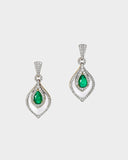 A beautifully crafted pendant and earring set featuring pear-shaped emeralds, diamonds, and mother-of-pearl, blending vibrant colour with delicate design for luxurious elegance. (PGDPE0119)