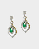 A beautifully crafted pendant and earring set featuring pear-shaped emeralds, diamonds, and mother-of-pearl, blending vibrant colour with delicate design for luxurious elegance. (PGDPE0119)