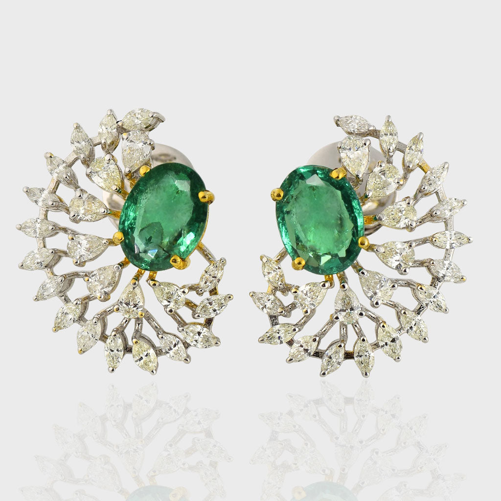 Step into elegance with our captivating half-round earring pair, showcasing exquisite emerald-cut ovals embraced by dazzling diamonds. Radiate sophistication with every turn.(PGDE0341)