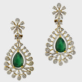 Adorn yourself in elegance with our exquisite long earring pair, featuring pear-shaped emeralds delicately embraced by shimmering diamonds (PGDE0374)