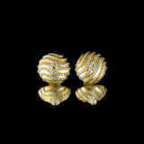 Classic and elegant tops pair featuring a central diamond mutual cut solitaire, gracefully surrounded by sparkling round diamonds—perfect for adding timeless brilliance to any ensemble.(PGDE0402)