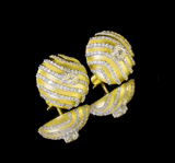 Classic and elegant tops pair featuring a central diamond mutual cut solitaire, gracefully surrounded by sparkling round diamonds—perfect for adding timeless brilliance to any ensemble.(PGDE0402)