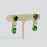 Elegant earrings featuring premium oval emeralds and pear-shaped diamonds, offering timeless beauty and refined sophistication(PGDE0424)