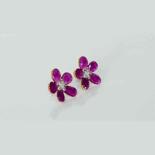 Inspired by blooming flowers, these ruby and diamond tops add a touch of color, sparkle, and sophistication to every look.(PGDE0437)