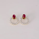 Ruby & Diamond Halo Earrings Brilliant ruby stud earrings embraced by a sparkling halo of round diamonds, blending timeless elegance with contemporary sophistication for every occasion.(PGDE0443)
