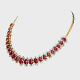 Embrace luxury and allure with our Ruby oval and diamond Necklace cum Bracelet set. Radiating elegance and sophistication, this exquisite ensemble effortlessly blends classic charm with modern glamour.(PGDNE0126)