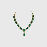 Exquisite necklace and earring pair featuring octagon-shaped emeralds accented with sparkling round diamonds—a perfect blend of luxury, elegance, and timeless beauty for any special occasion.(PGDNE0143)