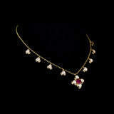 Ruby & Diamond Polki Necklace Graceful gold chain necklace featuring a vibrant ruby centerpiece, accented with diamond polki and brilliant round diamonds for timeless elegance and charm.(PGDNE0154)