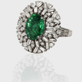 Emerald and Diamond Ring, featuring captivating oval emeralds and sparkling diamond baguettes and round. Each exquisite detail is meticulously crafted to exude elegance and charm, making it the perfect statement piece for any occasion.(PGDR0365)