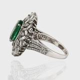 Emerald and Diamond Ring, featuring captivating oval emeralds and sparkling diamond baguettes and round. Each exquisite detail is meticulously crafted to exude elegance and charm, making it the perfect statement piece for any occasion.(PGDR0365)