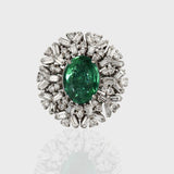 Emerald and Diamond Ring, featuring captivating oval emeralds and sparkling diamond baguettes and round. Each exquisite detail is meticulously crafted to exude elegance and charm, making it the perfect statement piece for any occasion.(PGDR0365)