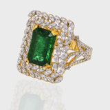 Emerald Octagon and Diamond Round Ring, Crafted to perfection, this exquisite piece harmonizes the allure of a striking octagonal emerald with the brilliance of surrounding diamond rounds.(PGDR0370)