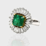 Introducing our striking Emerald Octagon Ring, adorned with a mesmerizing combination of diamond baguettes and marquise-cut diamonds, creating a truly breathtaking piece that radiates sophistication and glamour.(PGDR0417)