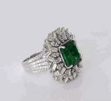 Elegant octagon emerald ring adorned with high-quality round and baguette diamonds—perfect blend of sophistication and timeless beauty.(PGDR0462)