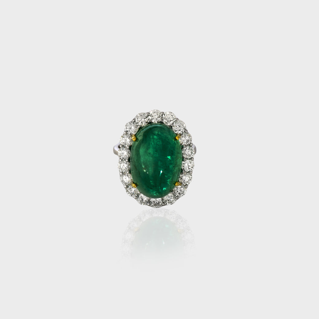 Stunning Colombian emerald ring of exceptional quality, beautifully accented with sparkling round diamonds—timeless elegance for every occasion.(PGDR0464)