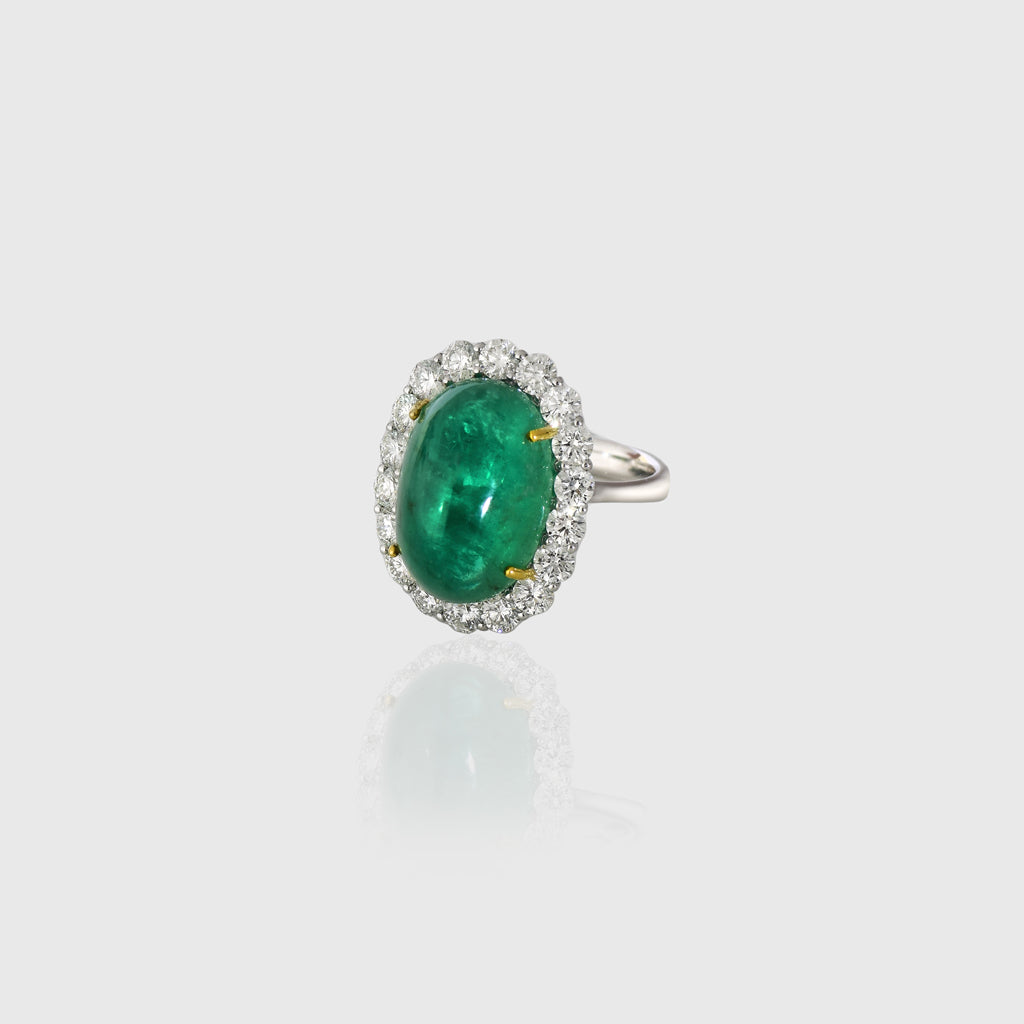 Stunning Colombian emerald ring of exceptional quality, beautifully accented with sparkling round diamonds—timeless elegance for every occasion.(PGDR0464)