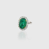 Stunning Colombian emerald ring of exceptional quality, beautifully accented with sparkling round diamonds—timeless elegance for every occasion.(PGDR0464)