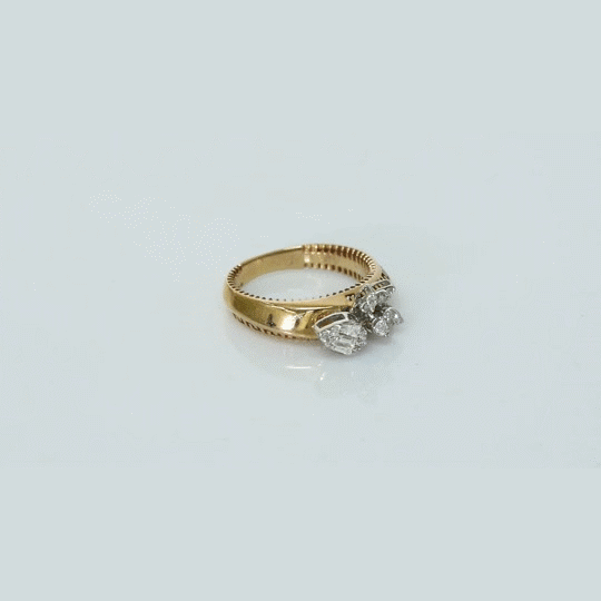 Delicate and stylish, this diamond ring showcases beautiful cuts that sparkle from every angle.(PGDR0500)
