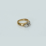 Delicate and stylish, this diamond ring showcases beautiful cuts that sparkle from every angle.(PGDR0500)