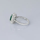 A fine emerald centerpiece surrounded by sparkling diamonds, creating a timeless ring filled with elegance, beauty, and charm.(PGDR0511)