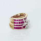 Layers of radiant rubies framed with shimmering diamonds, crowned by a floral diamond motif—pure elegance in every detail. (PGDR0517)
