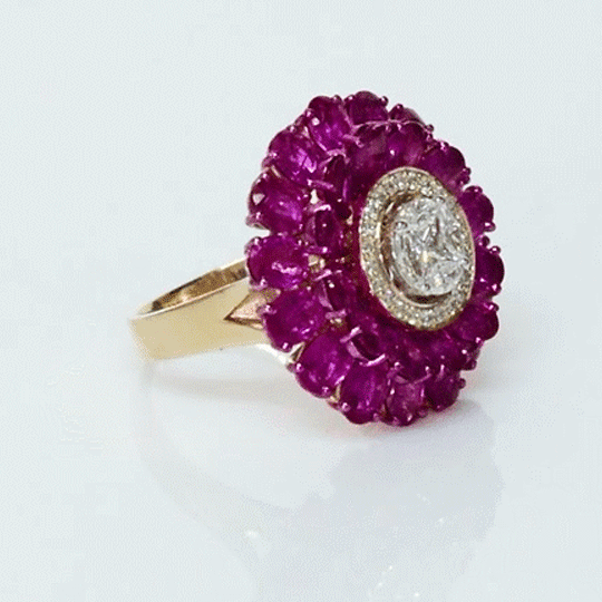 A radiant floral ring featuring vibrant rubies and sparkling diamonds, designed to capture attention with timeless elegance.(PGDR0519)