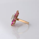 Ruby petals and sparkling diamonds bloom together in this floral ring, creating a vibrant and elegant statement piece.(PGDR0521)
