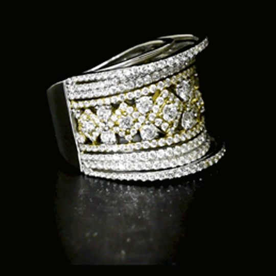 Diamond Statement Ring Bold statement ring featuring brilliant round diamonds in an intricate floral lattice design, framed by sparkling diamond rows for contemporary elegance and brilliance.(PGDR053)