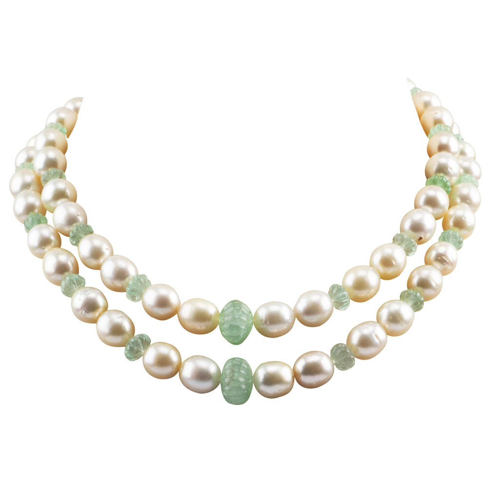 Two line necklace with emerald carved beads and south sea pearls with gold clasp STRG263