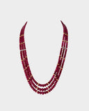 A luxurious three-layer necklace of premium Burmese ruby beads accented with diamond rondelles, showcasing rich colour, exceptional quality, and timeless elegance for a refined statement look. (STRG390)