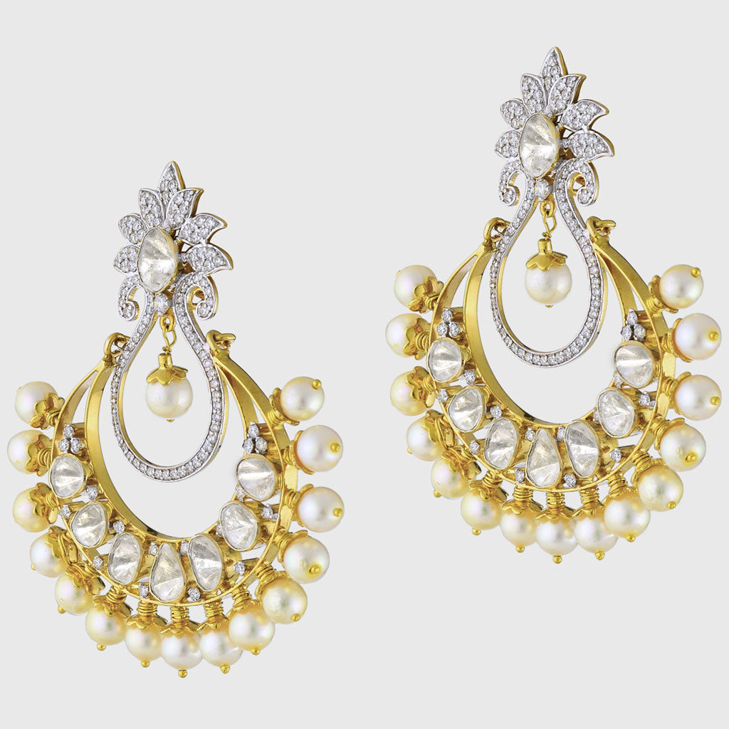 Dazzle with sophistication in our Chandbali-style earrings, featuring mesmerizing diamond polki, radiant diamond rounds, and delicate pearls.(WDN1121)