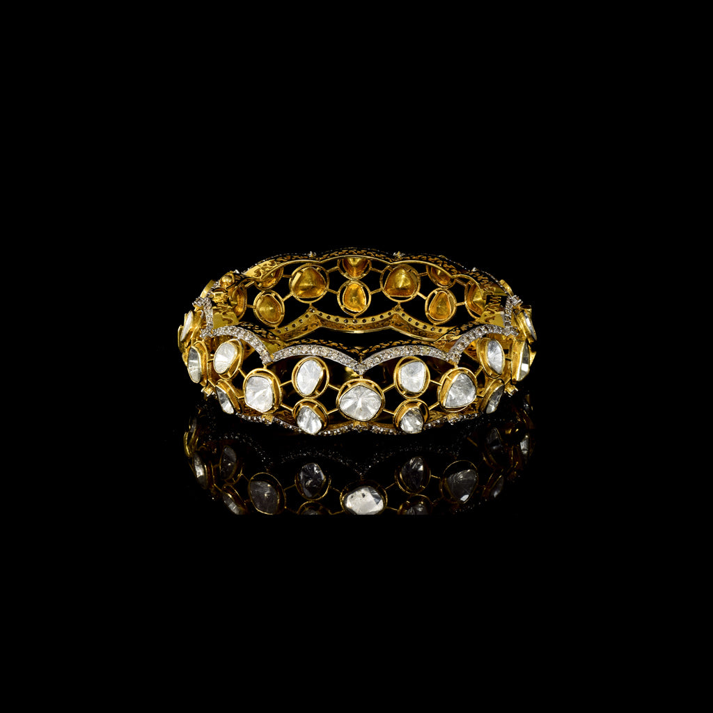 Bold fusion-style broad kada featuring uncut diamond Polki and sparkling round diamonds—perfectly blending traditional craftsmanship with contemporary elegance for a statement-making accessory.(WDN1179)