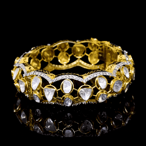 Bold fusion-style broad kada featuring uncut diamond Polki and sparkling round diamonds—perfectly blending traditional craftsmanship with contemporary elegance for a statement-making accessory.(WDN1179)