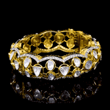 Bold fusion-style broad kada featuring uncut diamond Polki and sparkling round diamonds—perfectly blending traditional craftsmanship with contemporary elegance for a statement-making accessory.(WDN1179)